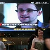 Snowden trên một chương trình tivi tại một trung tâm thương mại ở Hong Kong. (Nguồn: guardian.co.uk)