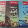 Ba tập sách “Những tấm gương bình dị mà cao quý" (Ảnh: Nguyễn Anh/ Vietnam+)