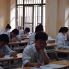 Thí sinh tại Hội đồng thi trường Bán công Đông Đa đang làm bài thi môn Ngữ văn (Ảnh: Nguyễn Anh/ Vietnam+) 