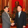 Chủ tịch nước tiếp Bộ trưởng Ngoại giao và Thương mại Hàn Quốc Yu Myung-hwan. (Ảnh: Nguyễn Khang/TTXVN).
