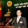 Bộ trưởng Bộ Công Thương Vũ Huy Hoàng trình bày tờ trình về chủ trương đầu tư dự án Nhà máy thủy điện Lai Châu và dự án điện hạt nhân Ninh Thuận. (Ảnh: Doãn Tấn/TTXVN).