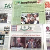 Báo hàng ngày bằng tiếng Arập giới thiệu về cuộc bầu cử tổng thống và quốc hội Iraq, được bán ở Iraq ngày 26/7. (Ảnh: AFP/TTXVN).