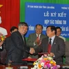 Lễ ký kết hợp tác thông tin giữa tỉnh Lâm Đồng với TTXVN. (Ảnh: Phan Văn Đông/Vietnam+).