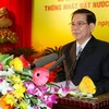 Chủ tịch nước Nguyễn Minh Triết đọc diễn văn tại lễ kỷ niệm. (Ảnh: Đinh Xuân Tuân/TTXVN).