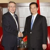 Thủ tướng Nguyễn Tấn Dũng gặp Phó Thủ tướng Australia Wayne Swan. (Ảnh: Đức Tám/TTXVN)