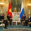 Tổng Bí thư Nông Đức Mạnh hội đàm hẹp với Tổng thống Liên bang Nga. (Ảnh: Đinh Xuân Tuân/TTXVN).