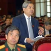 Bộ trưởng Bộ Tài nguyên và Môi trường Phạm Khôi Nguyên phát biểu ý kiến. (Ảnh: Doãn Tấn/TTXVN).