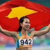 Trương Thanh Hằng vui mừng sau khi đoạt huy chương bạc nội dung 1.500 mét nữ. (Ảnh: Quốc Khánh/TTXVN).
