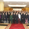 Tổng bí thư , Chủ tịch Quốc hội Nguyễn Phú Trọng với các lãnh đạo Đảng, Nhà nước và các đại biểu tại cuộc gặp mặt. (Ảnh: Trí Dũng/TTXVN)
