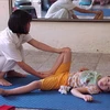 Chăm sóc trẻ em ở Làng Hòa Bình-Thanh Xuân. (Ảnh: Internet)