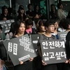 Biểu tình phản đối vụ sát hại cô dâu Việt tại Hàn Quốc. (Ảnh: Anh Nguyên/Vietnam+)