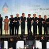 Phó Thủ tướng kiêm Bộ trưởng Ngoại giao Việt Nam Phạm Gia Khiêm cùng các đại biểu. (Ảnh: AFP/TTXVN)