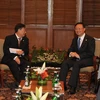 Phó Thủ tướng kiêm Bộ trưởng Ngoại giao Phạm Gia Khiêm và Bộ trưởng Ngoại giao Trung Quốc Dương Khiết Trì trong cuộc gặp tại Bali. (Ảnh: THX/TTXVN)
