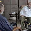 Ảnh về cuộc phỏng vấn giữa nhà báo Mario Silva với lãnh tụ Cách mạng Cuba Fidel Castro được phát trên đài truyền hình Venezuela. (Nguồn: Reuters)