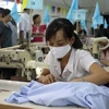 Dệt may là một trong những mặt hàng xuất khẩu chủ lực của Việt Nam sang Hoa Kỳ. (Ảnh minh họa: Thanh Vũ/TTXVN)