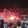 Cảnh hỗn loạn tại sân vận động ở Port Said. (Nguồn: Reuters)