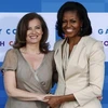 Bà Valerie Trierweiler và đệ nhất phu nhân Mỹ Michelle Obama. (Nguồn: Internet)