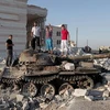 Một chiếc xe tăng bị phá hủy ở Syria. (Nguồn: Getty Images)