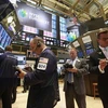 Nhà đầu tư tại Sàn giao dịch chứng khoán New York ngày 8/8/2012. (Nguồn: Reuters)