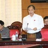 Chủ nhiệm Ủy ban Pháp luật của Quốc hội Phan Trung Lý trình bày tờ trình. (Ảnh: Phương Hoa/TTXVN)
