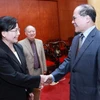 Chủ tịch Quốc hội Nguyễn Sinh Hùng tiếp Đoàn đại biểu Kiểm toán Nhà nước Lào. (Ảnh: Nhan Sáng/TTXVN)