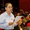 Đại biểu Quốc hội tỉnh Bình Thuận, Lê Đắc Lâm phát biểu ý kiến. (Ảnh: Nguyễn Dân/TTXVN)