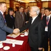 Tổng Bí thư Nguyễn Phú Trọng với các đại biểu tại buổi tiếp. (Ảnh: Trí Dũng/TTXVN)