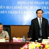 Ông Phạm Quang Nghị, Ủy viên Bộ Chính trị, Bí thư Thành ủy phát biểu tại buổi làm việc với Ngân hàng Liên doanh Lào-Việt. (Ảnh: Hoàng Chương/Vietnam+)