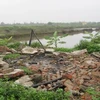 Khu chòi canh đầm của gia đình nhà ông Đoàn Văn Vươn bị phá hủy. (Nguồn: Chinhphu.vn)