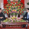 Chủ tịch nước Trương Tấn Sang tiếp Chánh án Tòa án nhân dân Tối cao Lào. (Ảnh: Nguyễn Khang/TTXVN)