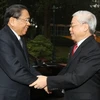 Tổng Bí thư Nguyễn Phú Trọng đón tiếp Tổng Bí thư, Chủ tịch nước Lào Chummaly Sayasone. (Ảnh: Trí Dũng/TTXVN)