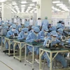 Dây chuyền sản xuất tại Công ty TNHH Linh kiện điện tử Sanyo OPT Việt Nam. (Nguồn: Báo Bắc Giang)