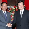 Chủ tịch nước Trương Tấn Sang và trưởng Đoàn đại biểu Đảng nhân dân Campuchia. (Ảnh: Nguyễn Khang/TTXVN)