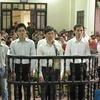 Các bị cáo tại phiên tòa. (Ảnh: Nguyễn Văn Nhật/Vietnam+)