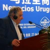 Tổng thống Mujica phát biểu tại hội thảo doanh nghiệp Uruguay-Trung Quốc. (Ảnh: Phủ Tổng thống Uruguay) 