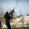 Một tay súng thuộc lực lượng đối lập Syria. (Nguồn: AFP/TTXVN)