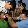 Khám và phẫu thuật miễn phí cho trẻ em hở môi và hở hàm ếch. (Ảnh: Nguyễn Thủy/TTXVN)
