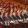 Các lãnh đạo Đảng, Nhà nước và các đại biểu dự hội nghị. (Ảnh: Dương Giang/TTXVN)