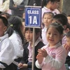 Học sinh vào lớp 1. (Ảnh: Phạm Mai/Vietnam+)