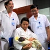 Kết quả ADN khẳng định, cháu bé được trao trả ngày 8/11 là con chị Thơm (Ảnh: Sơn Bách/Vietnam+)