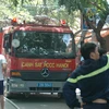 Xe cứu hỏa tiếp cận hiện trường (Ảnh: Sơn Bách/Vietnam+)