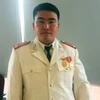 Trung úy Thào A Minh trong dịp được Bộ Công an khen thưởng (Ảnh: Sơn Bách/Vietnam+)