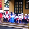 Đón khai giảng trong hành lang trường tiểu học Phan Đình Giót (Ảnh: Sơn Bách/Vietnam+)