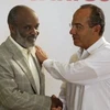 Tổng thống Haiti Rene Preval và người đồng cấp Mexico Felipe Calderon tại Playa del Carmen ngày 21/2. (Nguồn: AP)