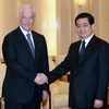 Chủ tịch Duma Quốc gia Nga Boris Gryzlov và Chủ tịch nước Trung Quốc Hồ Cẩm Đào. (Nguồn: Xinhua)