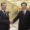 Chủ tịch nước Trung Quốc Hồ Cẩm Đào và Tổng thống thống Nga Dmitry Medvedev. (Nguồn: Xinhua)