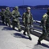 Hải quân Hàn Quốc tuần tra trên đảo Yeonpyeong thuộc vùng biển Hoàng Hải tranh chấp với Triều Tiên. (Ảnh: AFP/TTXVN)