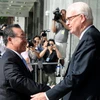 Thứ trưởng Ngoại giao Triều Tiên (trái) và Đặc phái viên Mỹ về Triều Tiên (phải) trước cuộc gặp ở New York. (Ảnh: AFP/TTXVN)