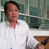 Ông Nguyễn Văn Tâm tại phòng làm việc ở Chi cục Quản lý thị trường Long An. (Nguồn: nld.com.vn)