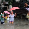 Cảnh ngập lụt sau những trận mưa lớn do bão Nock-ten tại thành phố San Juan, Philippines. Ảnh minh họa. (Nguồn: AFP/TTXVN)